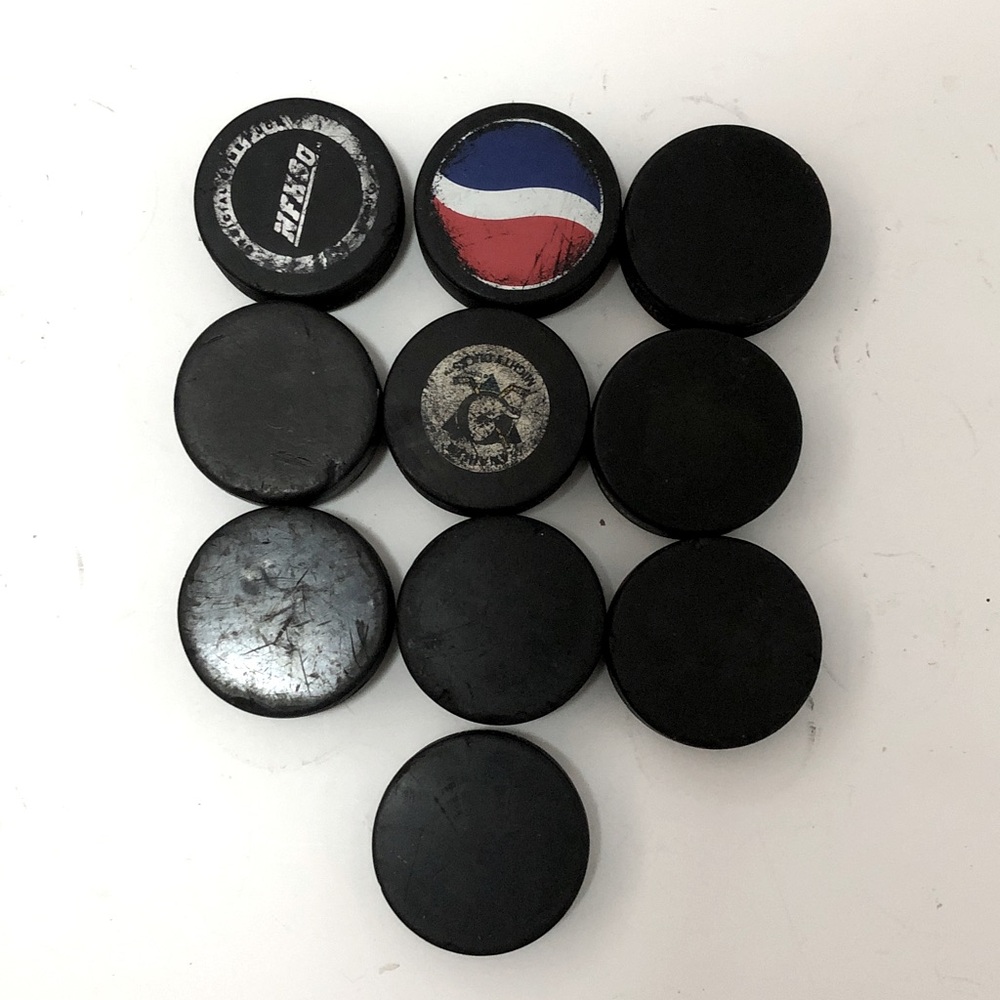 Black Hockey Pucks - Set of 10 used